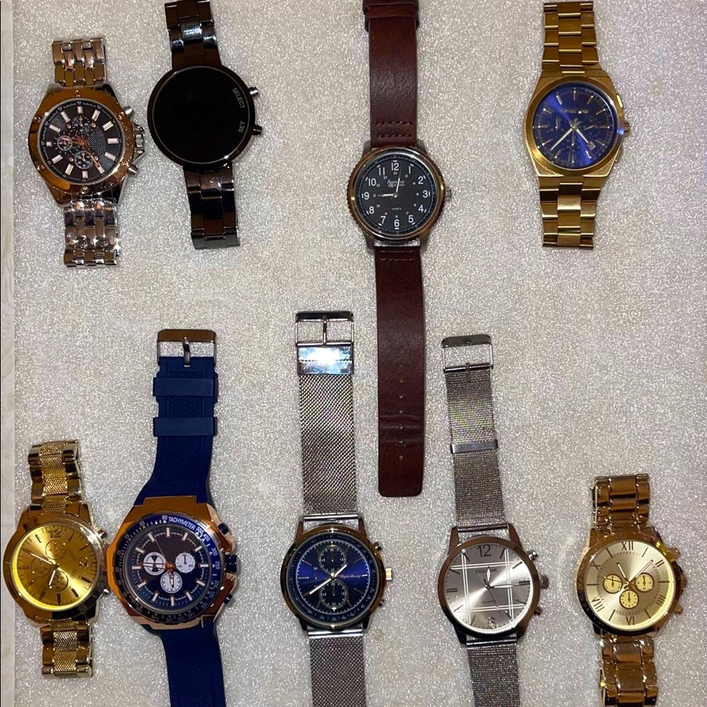 Assorted men’s watch collection including Michael Kors
